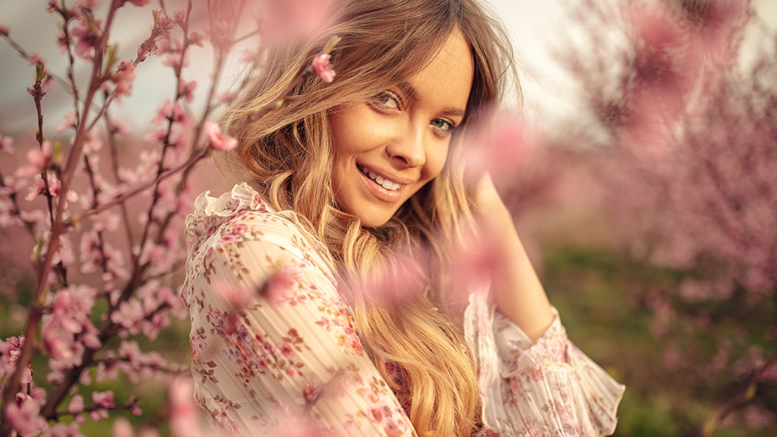 Young Woman In Orchard - Overal Health and Wellness